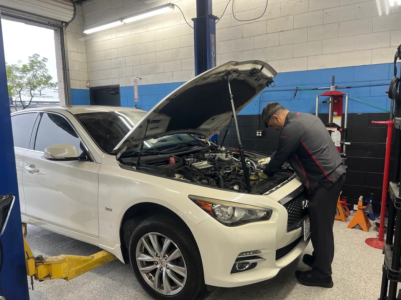 INFINITI being serviced at Rev It Auto Repair in El Cajon